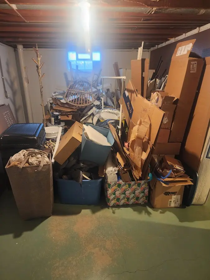 Roll-off dumpster container at job site for 2 Yard Dumpster Rental in Wetumpka